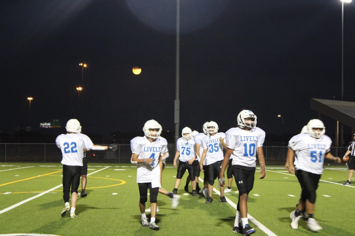 Lively 8th grade team playing under a full moon for Homecoming on September 17, 2024.