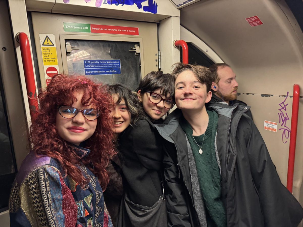 8th graders Ceci McArthur, Violeta Sanchez, Jayus F-L., and Samuel Nash on the Tube in London.